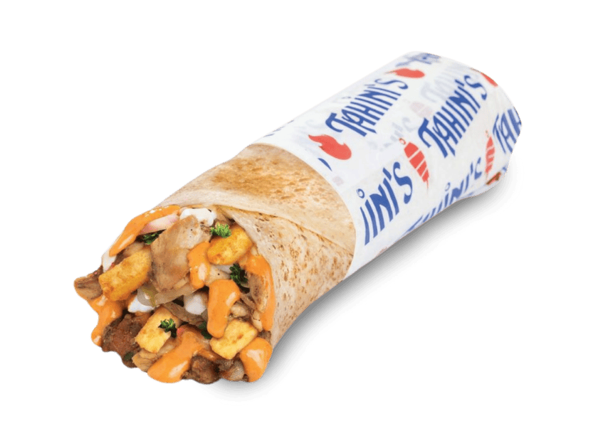 Chicken shawarma wrap rolled in saj bread with habanero, parsley, tomatoes, pickles and garlic sauce