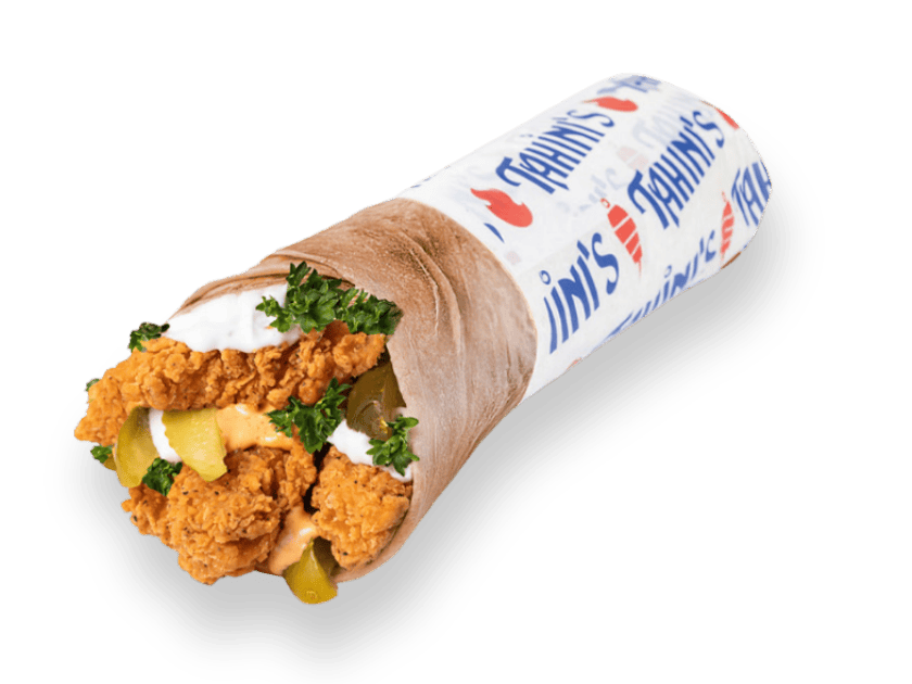Chicken shawarma wrap rolled in saj bread with habanero, parsley, pickles and garlic sauce